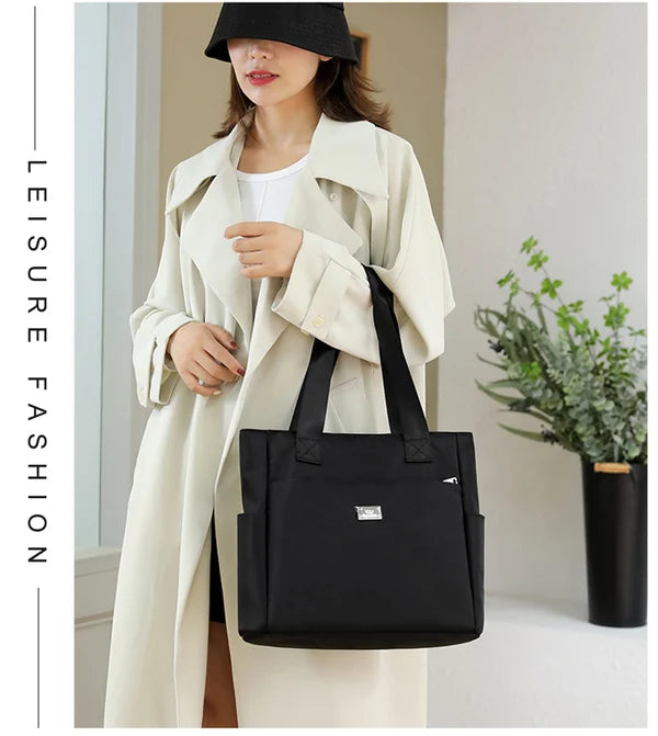 Wasserdichte Nylon-Schultertasche mit großem Fassungsvermögen und mehreren Taschen