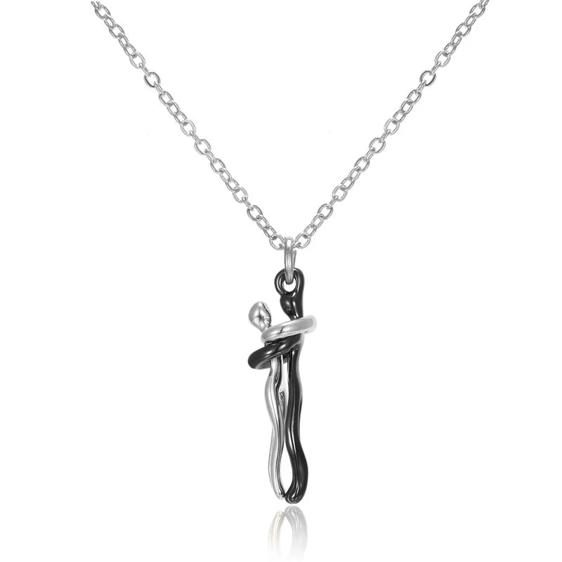 LoveNest – Embracing Couple Pendant Necklace