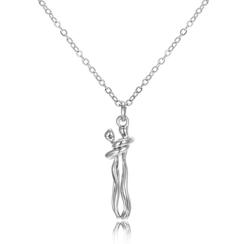 LoveNest – Embracing Couple Pendant Necklace