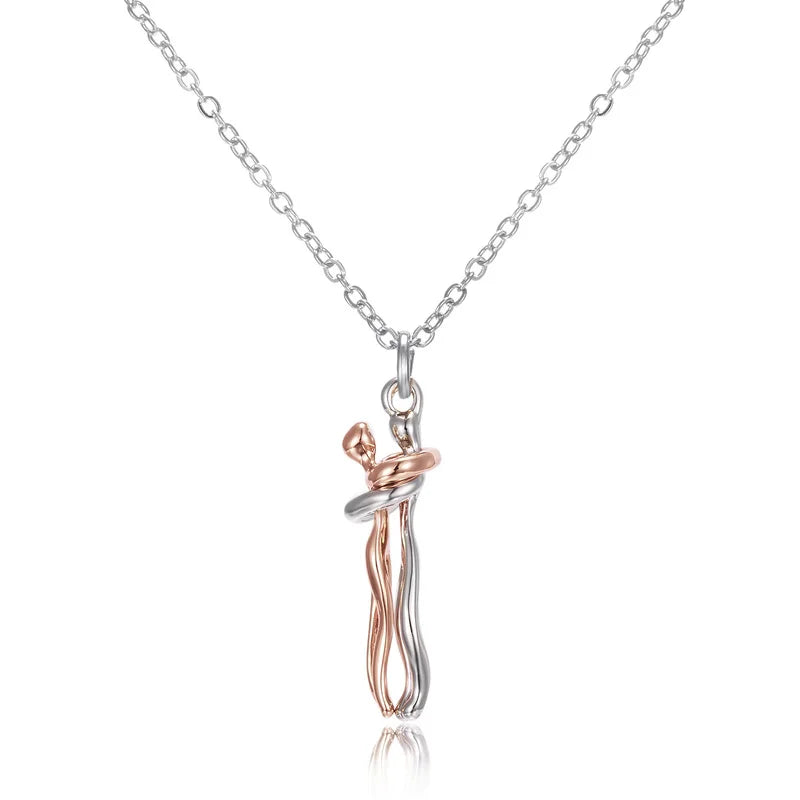 LoveNest – Embracing Couple Pendant Necklace