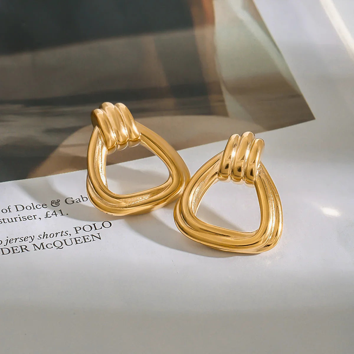 Boucles d'oreilles en or avec pendentif nœud Doris