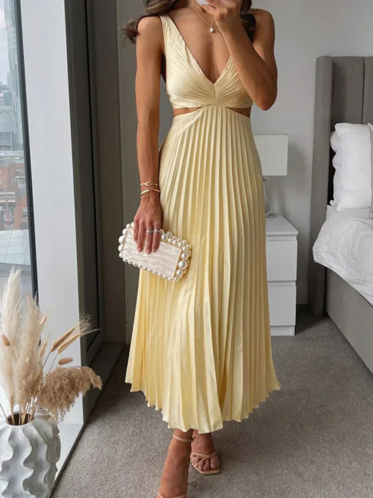 Zampia – Elegante jurk met split en getailleerde taille